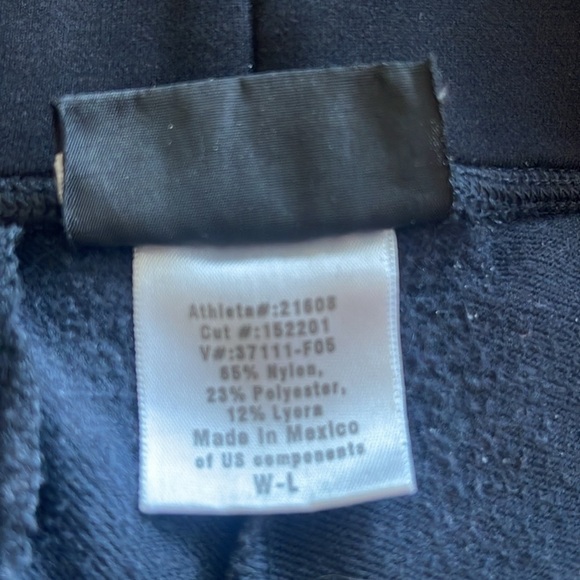 Athleta- black boot cut flare zipperr hem yoga leisure pantss - size L - Picture 6 of 7